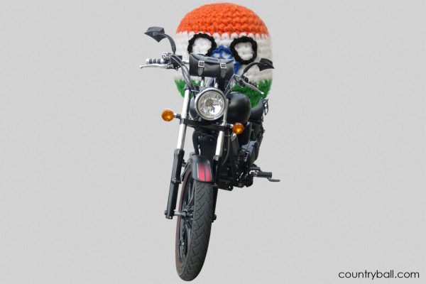 Indiaball riding a Motorbike